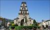 Iglesia Parroquial y monumento a D. Pelayo